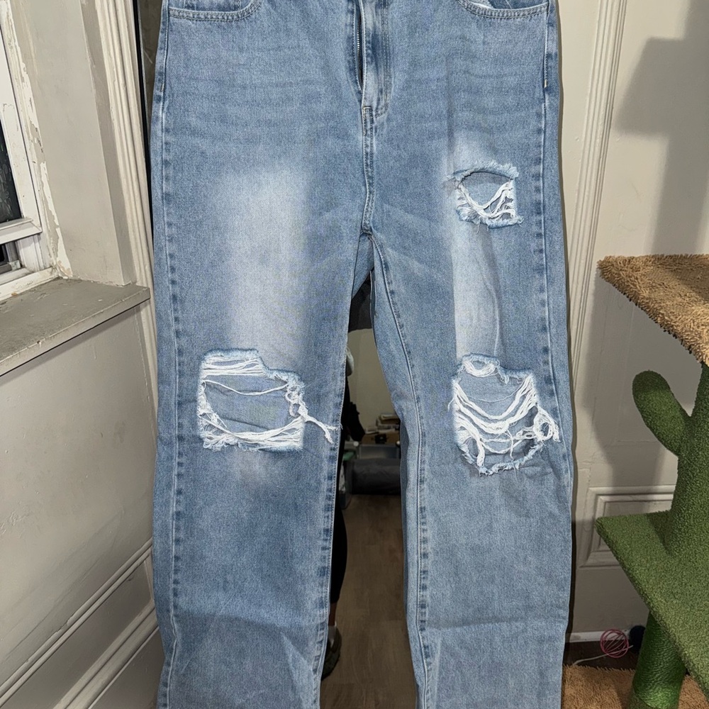 Distressed Light Blue Jeans